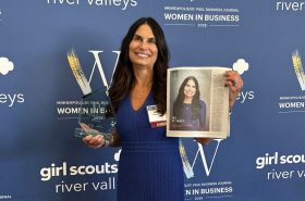 Jill Dunkley holding 2026 Women in Business award from Minneapolis/St. Paul Business Journal